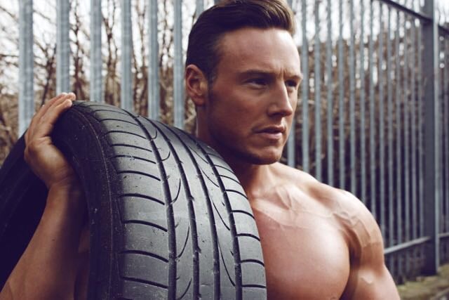 john clarke personal trainer with tyre